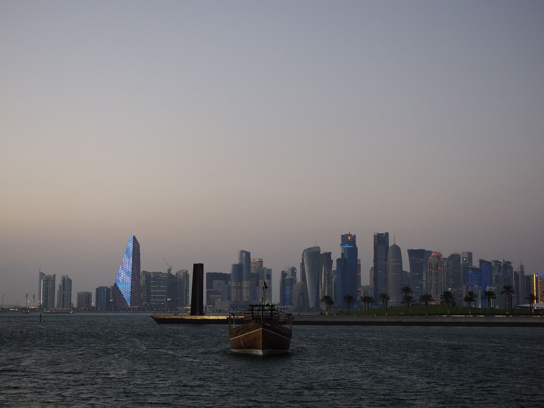 Muted skyline placeholder representing the Qatar market